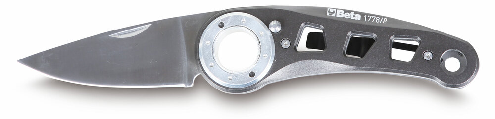 Nóż składany, ostrze i rękojeść ze stali nierdzewnej i aluminium, mechanizm otwierania przyciskiem , w pokrowcu model 1778p. 1
